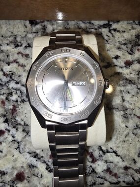 Citizen Silver-Tone Eco-Drive Watch with Day/Date